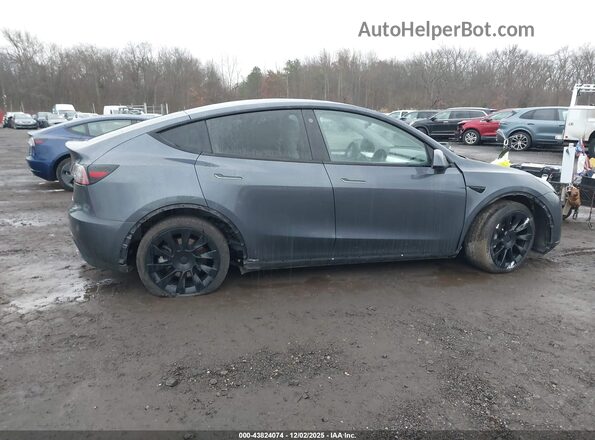 7SAYGDEE3PF754504 2023 TESLA MODEL Y Gray Вид задньої частини салону