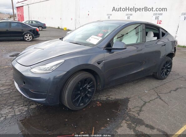 7SAYGDEE4NF430216 2022 TESLA MODEL Y Gray Передня ліва чверть