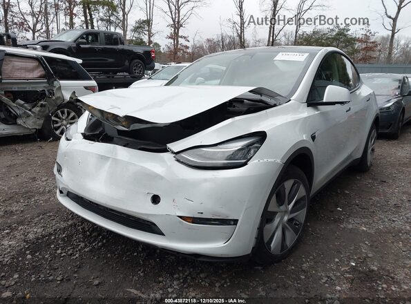 7SAYGDEE6PA124988 2023 TESLA MODEL Y Белый Передняя левая четверть