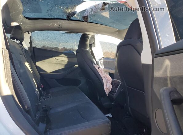 7SAYGDEE7TA380986 2026 TESLA MODEL White Սալոնի հետևի տեսք
