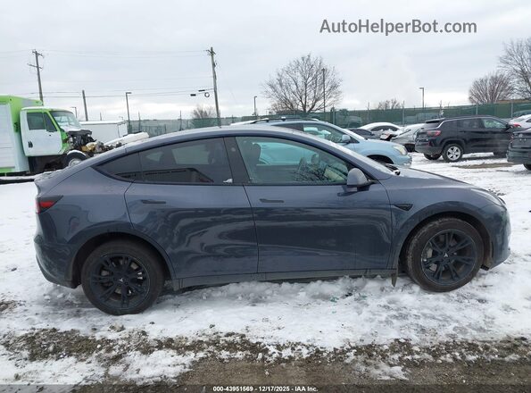 7SAYGDEEXPF834415 2023 TESLA MODEL Y Gray Vista interior trasera