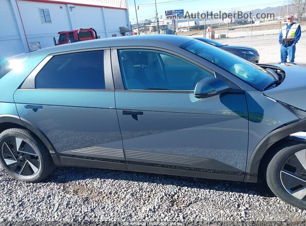 7YAKNDDC2TY040987 2026 HYUNDAI IONIQ 5 Teal Вид задньої частини салону