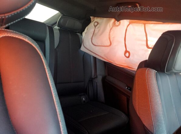 1GYKPMRK6RZ132487 2024 CADILLAC OTHER Gray Вид задньої частини салону