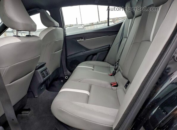 4T1DAACK0SU555829 2025 TOYOTA CAMRY Black Սալոնի հետևի տեսք