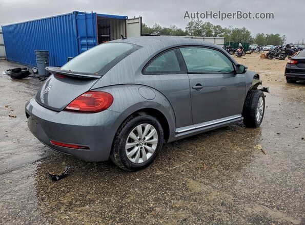 3VWFD7AT3KM706621 2019 VOLKSWAGEN BEETLE Silver Front right