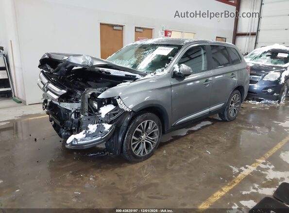 JA4AD3A30JJ002145 2018 MITSUBISHI OUTLANDER Серый Передняя левая четверть