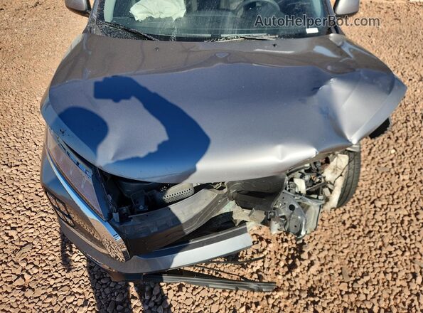 JA4APUAU7MU036611 2021 MITSUBISHI OUTLANDER Gray Vista del compartimento del motor