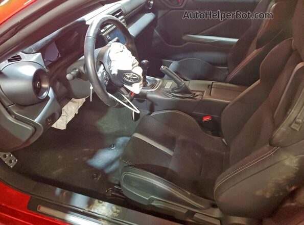 JF1ZNBE17S9753597 2025 TOYOTA GR Red Widok wnętrza z przodu
