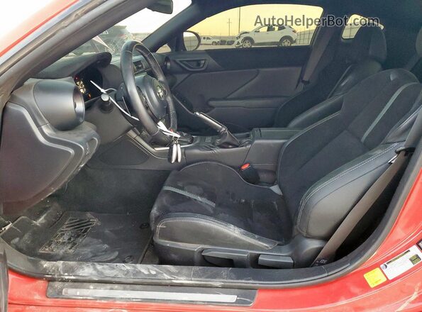 JF1ZNBF11P8765062 2023 TOYOTA GR Red Widok wnętrza z przodu