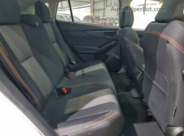 JF2GTAEC2PH212264 2023 SUBARU CROSSTREK White Vista interior trasera