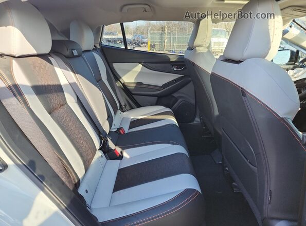 JF2GTHNCXP8274682 2023 SUBARU CROSSTREK White Vista interior trasera