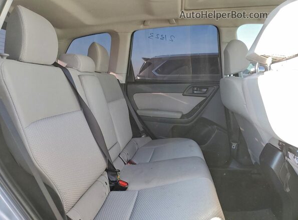 JF2SJADC3GH436063 2016 SUBARU FORESTER Silver Vista interior trasera