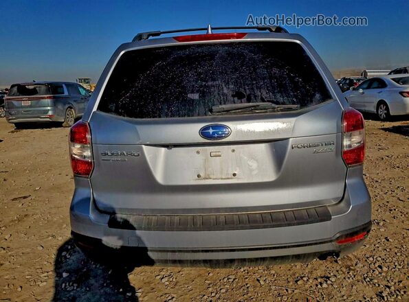 JF2SJADC3GH436063 2016 SUBARU FORESTER Silver Vista trasera