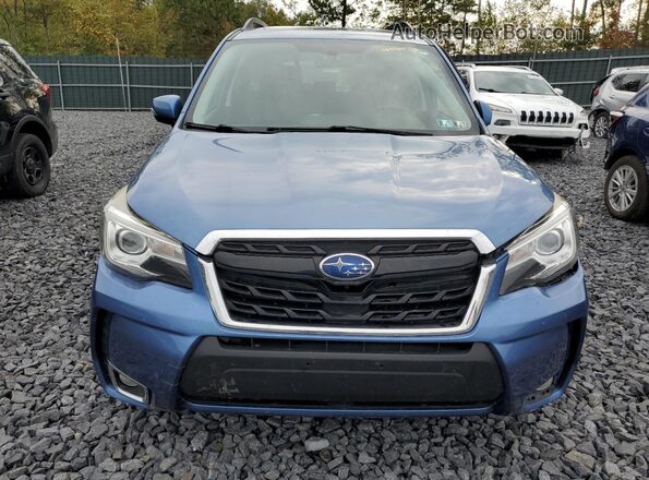 JF2SJGTCXHH462018 2017 SUBARU FORESTER2. Blue Front view