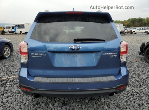 JF2SJGTCXHH462018 2017 SUBARU FORESTER2. Blue Rear view