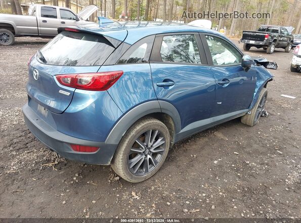 JM1DKFC79J0332222 2018 MAZDA CX-3 Синий Задняя правая четверть