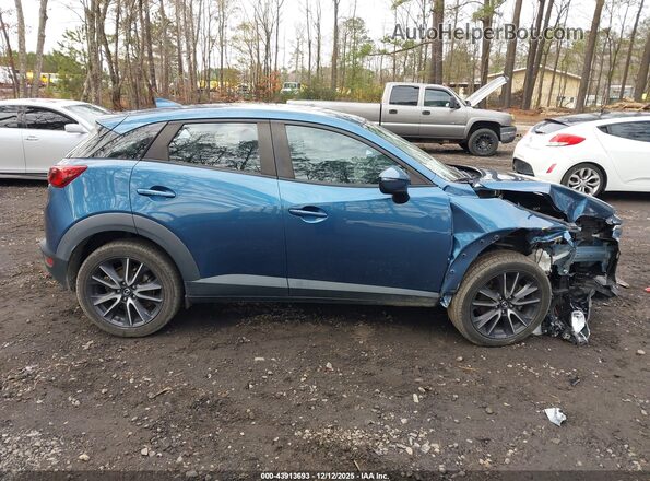 JM1DKFC79J0332222 2018 MAZDA CX-3 Синий Вид задней части салона