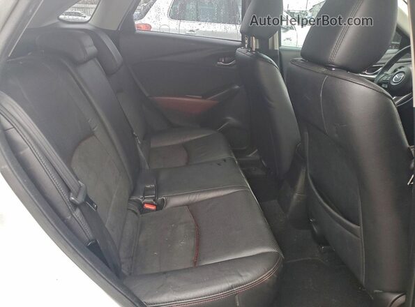 JM1DKFD72H0164948 2017 MAZDA CX-3 Серый Вид задней части салона