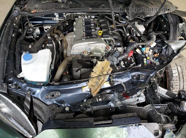 JM1NDAL79R0607889 2024 MAZDA MX-5 Green Vista interior trasera