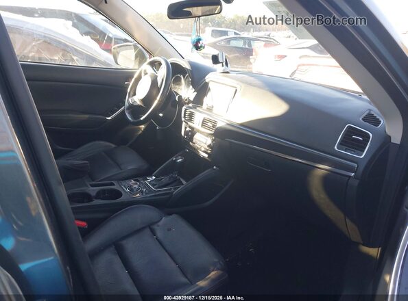 JM3KE4DY3G0837294 2016 MAZDA CX-5 Gray Вид салону спереду