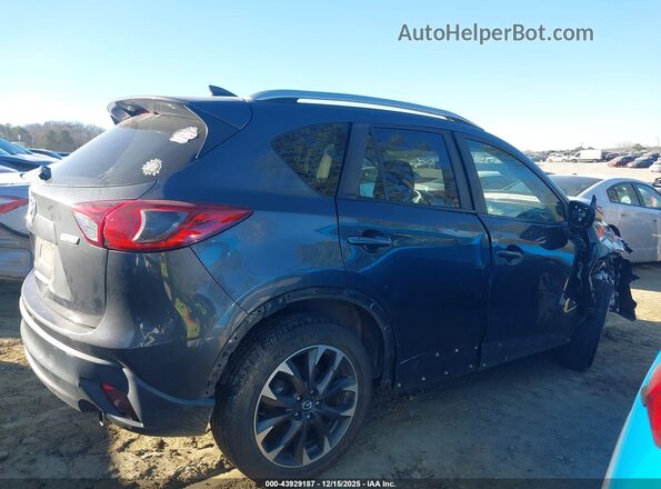 JM3KE4DY3G0837294 2016 MAZDA CX-5 Gray Вид задньої частини салону