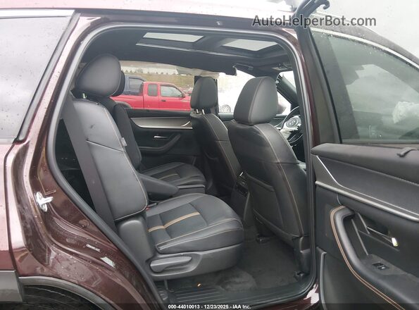 JM3KKEHA6R1123538 2024 MAZDA CX-90 PHEV Burgundy Vista de la etiqueta del VIN
