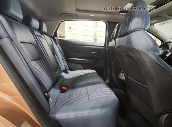 JN1DF0CD1PM710822 2023 NISSAN ARIYA Brown Vista interior trasera