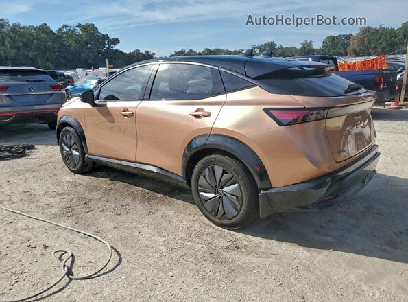 JN1DF0CD6PM709844 2023 NISSAN ARIYA Gold Trasero izquierdo