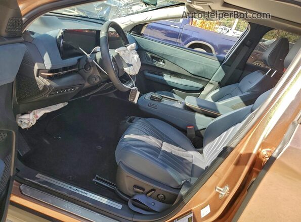 JN1DF0CD6PM709844 2023 NISSAN ARIYA Gold Vista interior delantera
