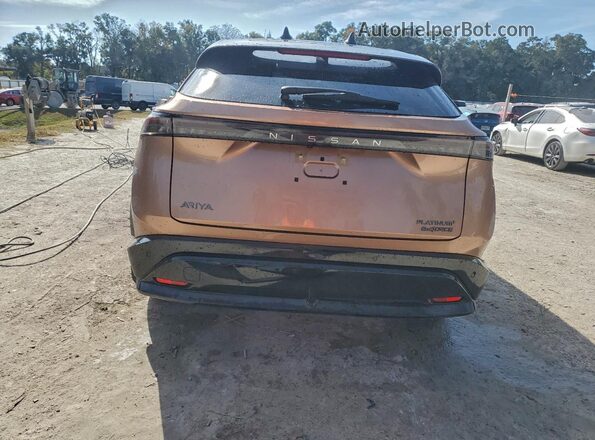 JN1DF0CD6PM709844 2023 NISSAN ARIYA Gold Vista trasera
