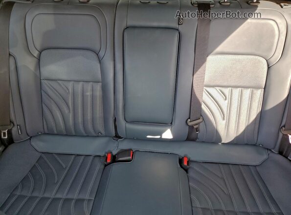JN1DF0CD6PM709844 2023 NISSAN ARIYA Gold Vista de los asientos traseros
