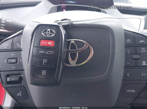 JTDACACU7R3033802 2024 TOYOTA PRIUS PRIME Red Widok deski rozdzielczej