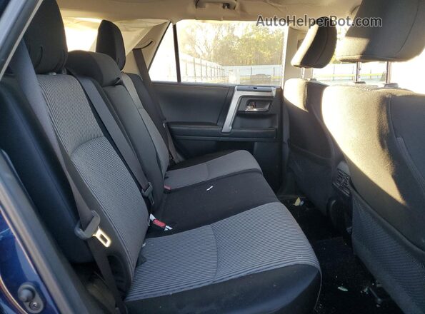 JTEMU5JR9R6233980 2024 TOYOTA 4RUNNER Blue Rear interior view