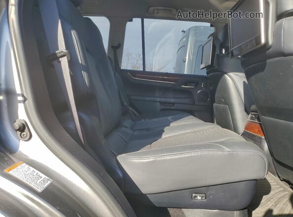 JTJDY7AX0L4317091 2020 LEXUS LX Tan Vista interior trasera