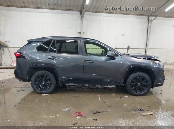 JTM16RFV2NJ015675 2022 TOYOTA RAV4 HYBRID Gray Rear interior view