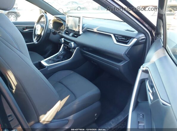 JTM16RFV5ND521452 2022 TOYOTA RAV4 HYBRID Black Front interior view