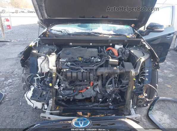 JTM16RFV5ND521452 2022 TOYOTA RAV4 HYBRID Black Rear view