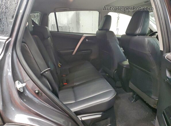 JTMDJREVXJD159643 2018 TOYOTA LIMITED Silver Vista interior trasera