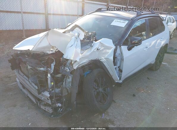 JTME6RFV7PJ038616 2023 TOYOTA RAV4 HYBRID White Vista tres cuartos delantera izquierda