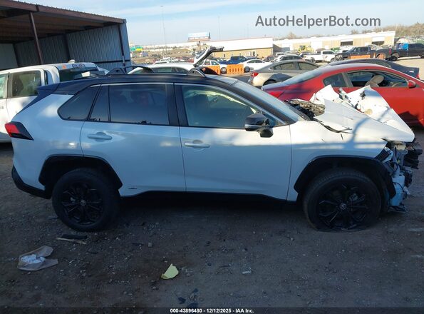 JTME6RFV7PJ038616 2023 TOYOTA RAV4 HYBRID White Vista interior trasera