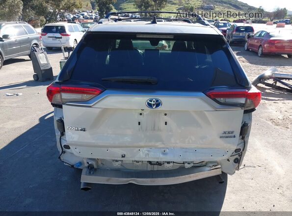 JTMEWRFV2KJ015298 2019 TOYOTA RAV4 HYBRID White 