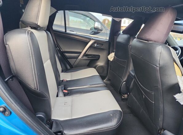 JTMJFREV3GD181755 2016 TOYOTA RAV4 Blue Rear interior view