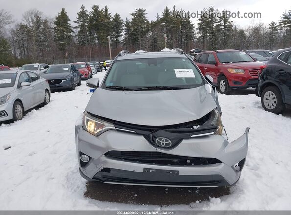 JTMRFREV9JJ212082 2018 TOYOTA LE Silver Вид задньої частини салону