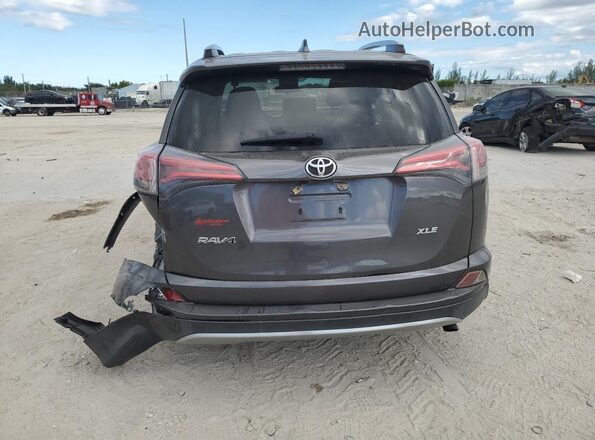 JTMWFREV3JJ184766 2018 TOYOTA RAV4 Charcoal Widok z tyłu