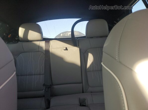 KL47LCE27RB197598 2024 BUICK OTHER Blue Rear seats view