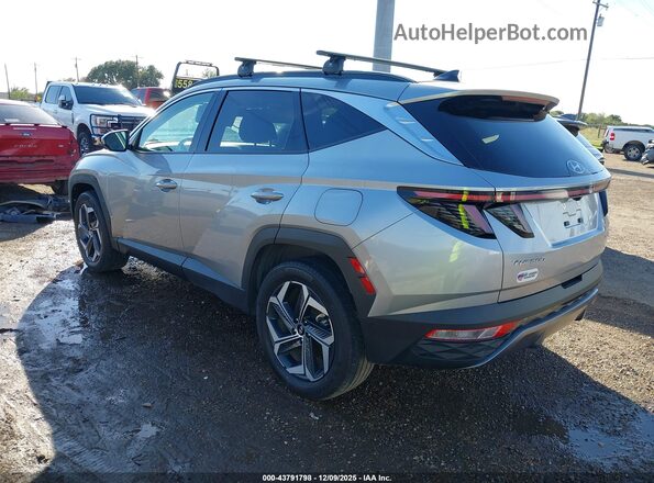 KM8JECD17RU161621 2024 HYUNDAI TUCSON HYBRID Silver Trasero izquierdo
