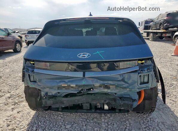 KM8KM4AB5PU127958 2023 HYUNDAI IONIQ Синий Вид сзади
