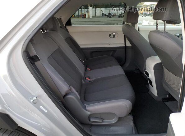 KM8KM4DB8RU341874 2024 HYUNDAI IONIQ Gray Widok wnętrza z tyłu