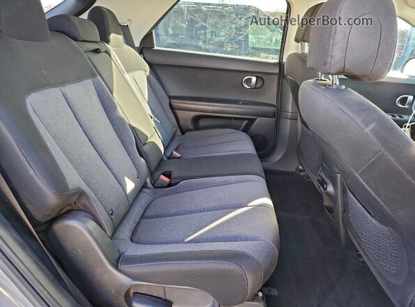 KM8KMDAF7PU143758 2023 HYUNDAI IONIQ Gray Rear interior view