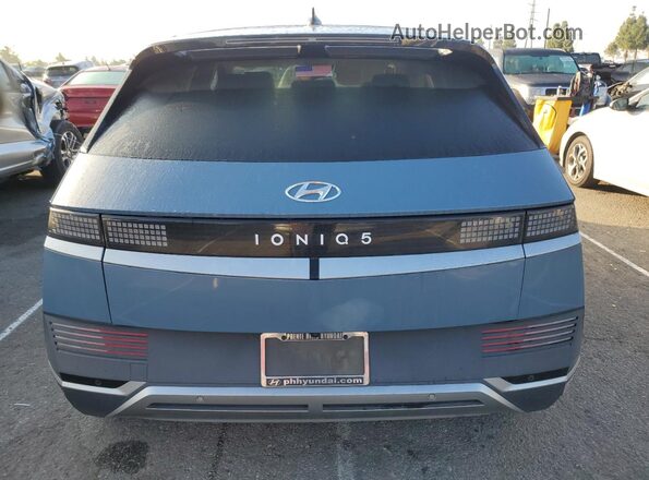 KM8KN4DEXRU251150 2024 HYUNDAI IONIQ Синий Вид сзади